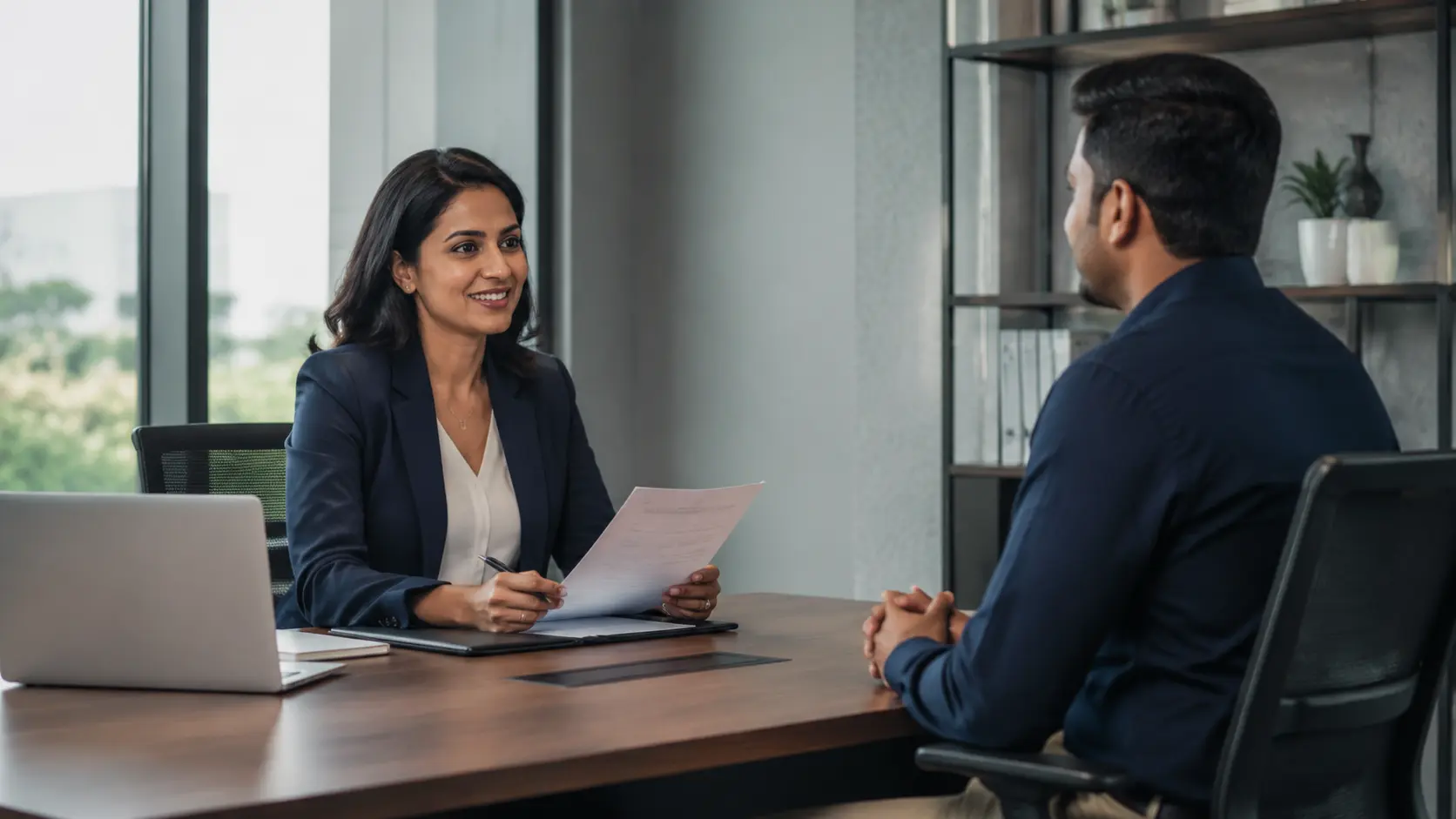 NBFC recovery manager meeting a customer in office